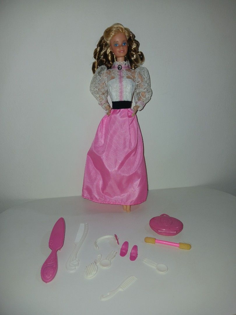 Angel Face Barbie (philippines) (Category: Kids Toys) located in Subic. Submitted by frncnjntmr22 (Listing ID 1464668682, Image 1). Description: - Barbie doll with beautiful blonde curly hair. - Dressed in an elegant white lace top and a flowing pink satin skirt. - Comes with a variety of hair styling accessories: brushes, clips, and a comb. - Ideal for sparking imaginative play and a great addition to any collection. - All items included are cle