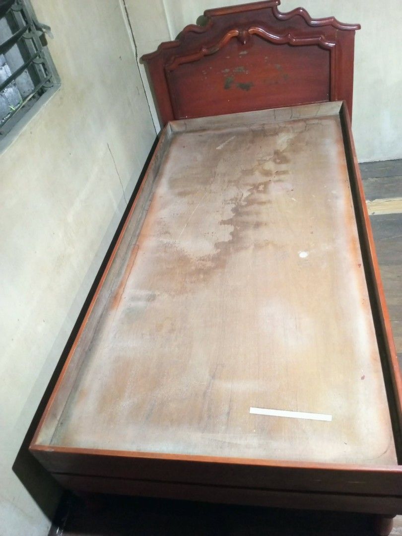 Antique Vintage Narra Single Bed w/Headboard (Category: Bed Frames & Mattresses) located in Quezon City. Submitted by blacked.market (Listing ID 1464586984, Image 2). Description: Dimensions: Height - 47 Meters Length - 206 Meters Width - 111 Meters Notes: - Needs a little Sanding, Varnish. - Plywood part is still intact. Location: Fairview Q.C. Mode of Payment: Cash/Gcash Pickup Delivery: - Should be arranged by the Buyer (Payment first before p