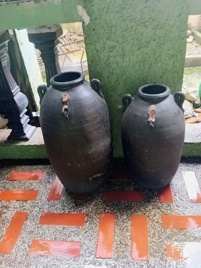 Antique Vintage Terracotta Jars/Burnay (Category: Pots & Planters) located in Quezon City. Submitted by blacked.market (Listing ID 1464592998, Image 1). Description: Notes: - Selling as a Set/Take all. 2pcs Height: Left - Length -57 Meters Width - 30 Meters Right - Length -50 Meters Width -27 Meters Location: Fairview Q.C. Mode of Payment: Cash/Gcash Pickup Delivery: - Should be arranged by the Buyer (Payment first before pickup of item). Thanks 
