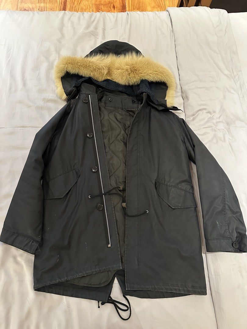 A.P.C. Fur Hooded Parka Jacket Coat (Category: Coats, Jackets and Outerwear) located in Makati City. Submitted by victorvillareal (Listing ID 1464708763, Image 1). Description: - Brand: A.P.C. - Size: Medium - Color: Black - Lining: Quilted interior with blue sherpa fleece - Hood: Large hood with faux fur trim - Closure: Front zipper and button - Pockets: Convenient flap pockets - Fit: Adjustable drawstring waist - Condition: Good winter piece to