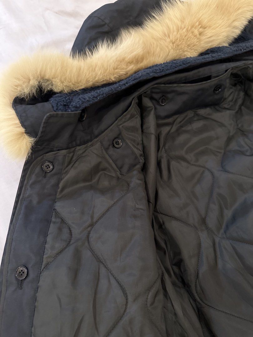 A.P.C. Fur Hooded Parka Jacket Coat (Category: Coats, Jackets and Outerwear) located in Makati City. Submitted by victorvillareal (Listing ID 1464708763, Image 2). Description: - Brand: A.P.C. - Size: Medium - Color: Black - Lining: Quilted interior with blue sherpa fleece - Hood: Large hood with faux fur trim - Closure: Front zipper and button - Pockets: Convenient flap pockets - Fit: Adjustable drawstring waist - Condition: Good winter piece to