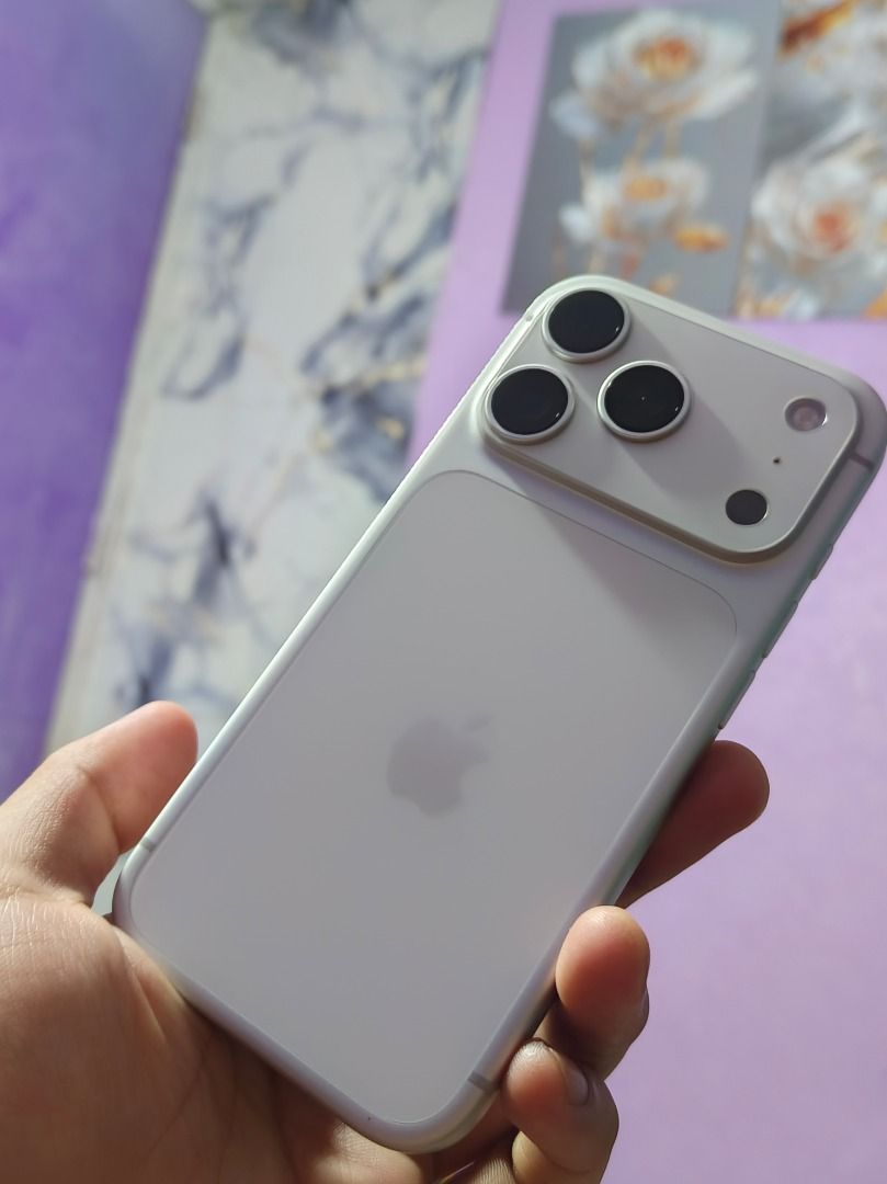 Apple iPhone 17 pro (Category: Cases & Sleeves) located in Caloocan City. Submitted by barbiemarjorie06 (Listing ID 1464696220, Image 3). Description: - Fitted with a sleek frosted white back case - Distinctive triple camera setup with black lenses - Iconic Apple logo centered on the back - Stylish light green or greyish edges - PM for more details and price negotiation.