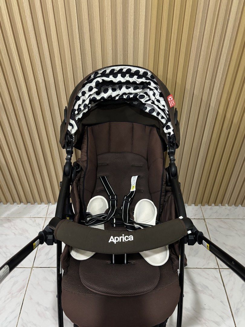 APRICA LUXUNA STROLLER 🟤🟤🟤 (Category: Strollers) located in Valenzuela. Submitted by jen_prelovedcorner.2 (Listing ID 1464595573, Image 3). Description: APRICA LUXUNA 🟤🟤🟤 ✔️High seat ✔️Lightweight ✔️Good for newborn to toddler ✔️Reclinable seat ✔️Reversible handle ✔️5 point harness ✔️Easy to open and fold ✔️Automatic wheels swiveling when you reverse the handle ✔️Full cover canopy with windows ✔️Breathable mesh seat Mall price 30,000+ SALE 