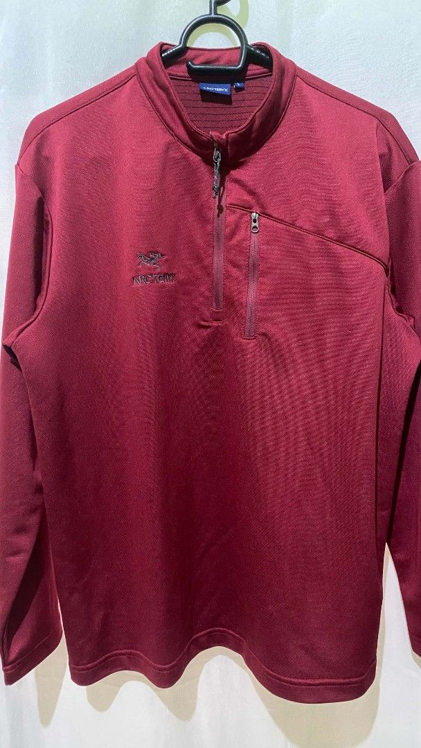 Arc'teryx Maroon Half-Zip Pullover Size L (Category: Coats, Jackets and Outerwear) located in Quezon City. Submitted by elihur.tuazon (Listing ID 1464737564, Image 2). Description: - Brand: Arc'teryx - Item: Half-zip pullover - Color: Maroon red - Size: L (tag on collar) - Features: Embroidered logo, left chest zippered pocket, stand-up collar, structured textured inner neckline - Condition: Great outdoor piece, ready to wear - Perfect for hiking