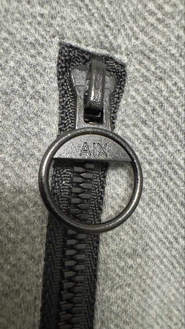Armani Exchange Grey Hoodie (Category: Coats, Jackets and Outerwear) located in Balanga. Submitted by bluesero (Listing ID 1464627161, Image 3). Description: - Grey Armani Exchange hoodie - Features AX logo graphic on front and back - Side zip pockets for convenience - Made from a comfortable cotton blend with elastic details - size W21.5in X 27.5in.