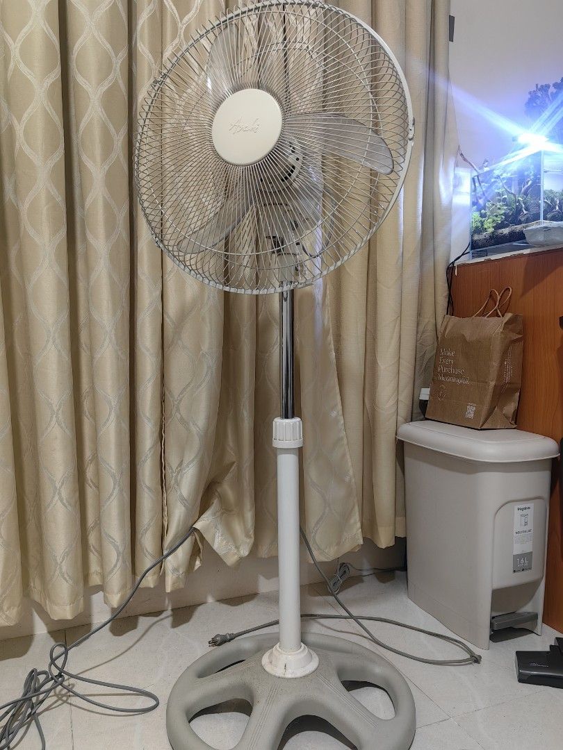 Asahi Stand Fan - White/Silver (Category: Fans) located in Makati City. Submitted by urstrulymaria (Listing ID 1464677243, Image 2). Description: - Asahi Stand Fan - Adjustable Height - Oscillates Side to Side - Works Well - Minor dust on base and stand - Ideal for cooling any room.