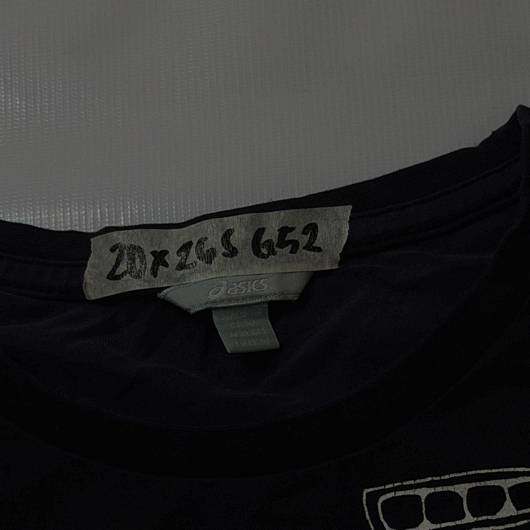 Asics Gel Since 1986 Black Graphic Tee (Category: Activewear) located in Manila. Submitted by johnedel_james (Listing ID 1464697350, Image 2). Description: - Brand: Asics - Color: Black - Design: Large sneaker teardown graphic with 'GEL SINCE 1986' on chest, small Asics logo near hem - Fit: Regular fit, crew neck, short sleeves - Style: Casual streetwear, perfect for sneaker fans - Condition: Good as new / Excellent.
