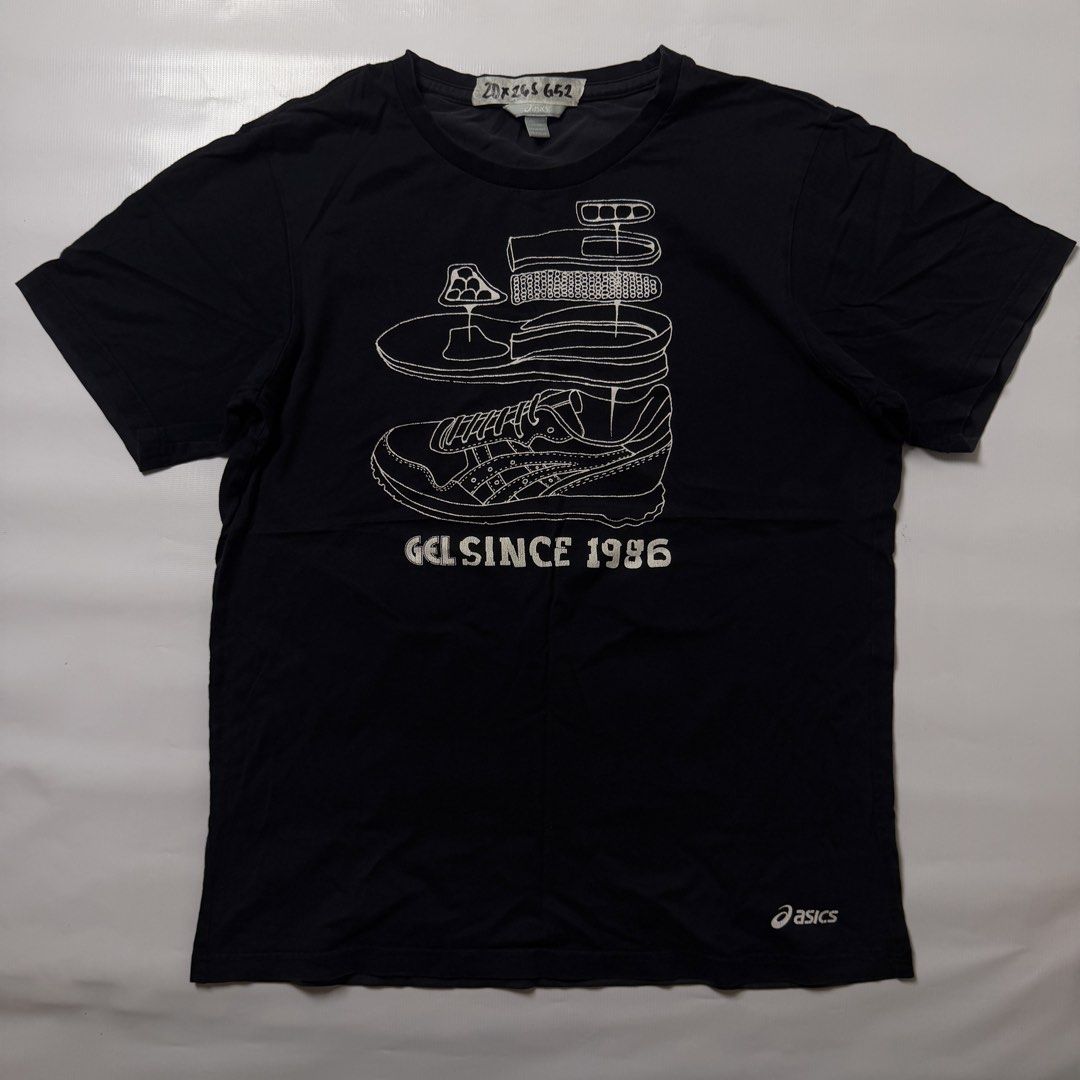 Asics Gel Since 1986 Black Graphic Tee (Category: Activewear) located in Manila. Submitted by johnedel_james (Listing ID 1464697350, Image 1). Description: - Brand: Asics - Color: Black - Design: Large sneaker teardown graphic with 'GEL SINCE 1986' on chest, small Asics logo near hem - Fit: Regular fit, crew neck, short sleeves - Style: Casual streetwear, perfect for sneaker fans - Condition: Good as new / Excellent.