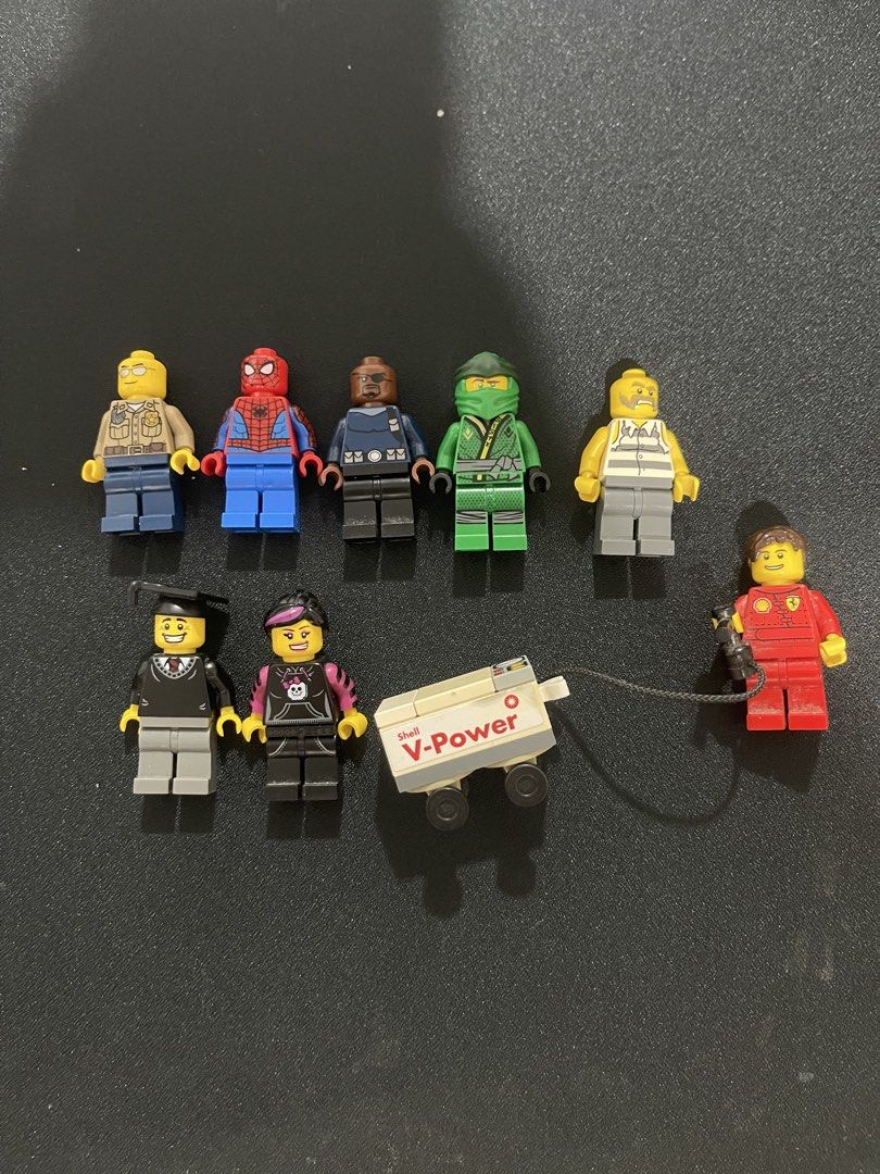 Assorted LEGO Mini Figures (Category: Lego & Building Sets) located in Paranaque City. Submitted by _bellethings (Listing ID 1464606724, Image 1). Description: Prices: Cop - 200 Spider-Man - 300 Nick Fury - 250 Lloyd Ninjago - 250 Robber - 200 Graduate - 450 Skater Girl - 450 Shell Guy - 350 All authentic MOP: GCash, Maribank MOD: Lalamove, J&T Parañaque .
