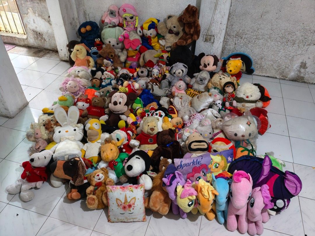 Assorted Plush Toys Bundle - Homer Simpson, Hello Kitty, MLP (Category: Plushies & Soft Toys) located in Taguig. Submitted by akosimilo2026 (Listing ID 1463286832, Image 3). Description: - Huge bundle of assorted plush toys - Features popular characters like Homer Simpson, Kitty, and My Little Pony - Includes various teddy bears and other fun characters - 8 XL GARBAGE BAG FULL OF ASSORTED STUFFED TOYS! - Ideal for collectors or as gifts for child