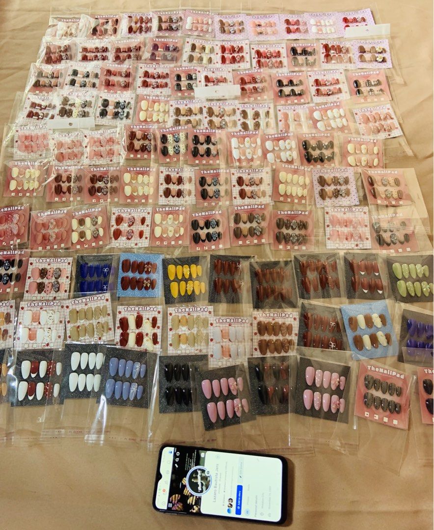 Assorted Press-On Nails - Various Designs and Colors (Category: Hands & Nails) located in Manila. Submitted by thenailpadbyjers (Listing ID 1464628096, Image 3). Description: - Huge selection of press-on nails available! - Many styles and colors: solid, patterned, glitter, and more. - Each set is individually packaged. - Perfect for a fast, salon-quality manicure. - Great for trying out different nail trends. - Can be purchased individually or as