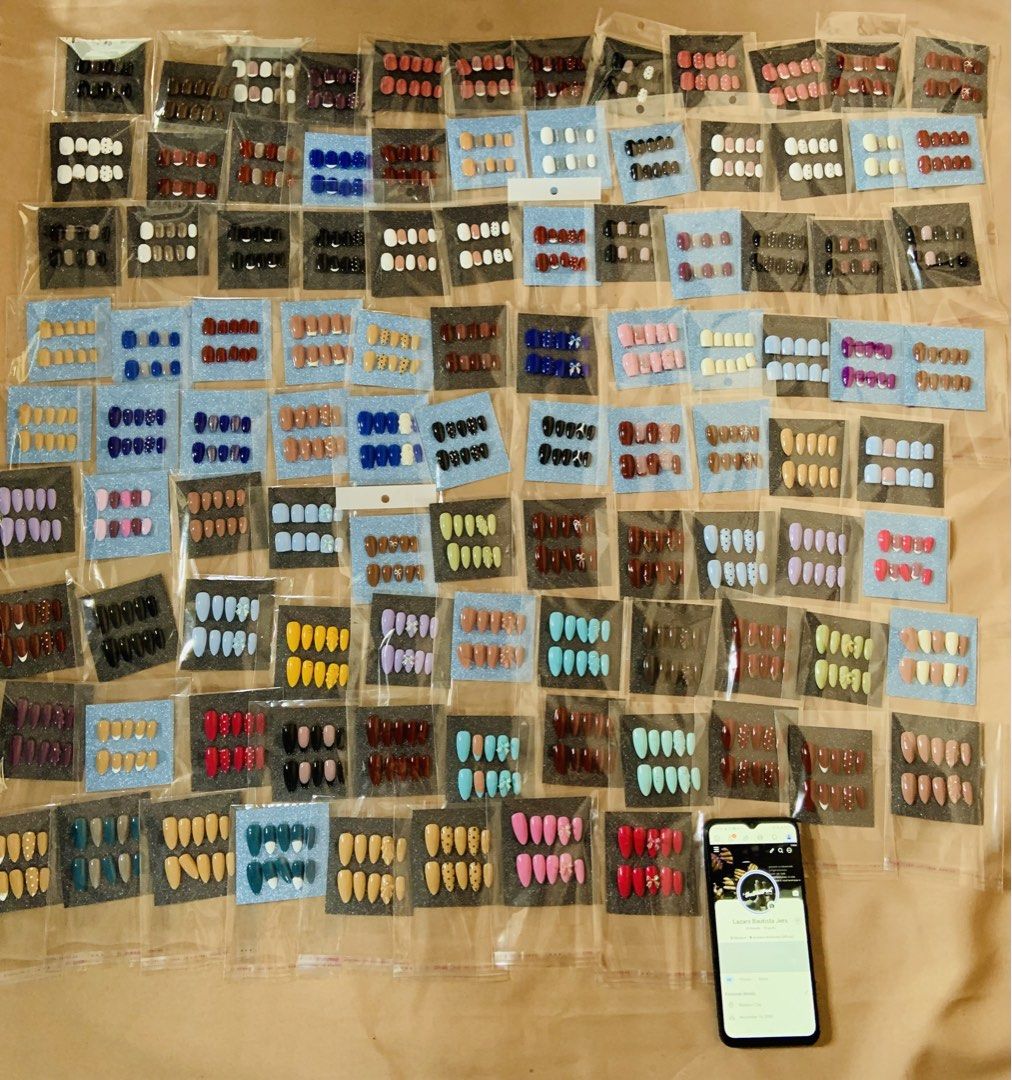 Assorted Press-On Nails - Various Designs and Colors (Category: Hands & Nails) located in Manila. Submitted by thenailpadbyjers (Listing ID 1464628096, Image 1). Description: - Huge selection of press-on nails available! - Many styles and colors: solid, patterned, glitter, and more. - Each set is individually packaged. - Perfect for a fast, salon-quality manicure. - Great for trying out different nail trends. - Can be purchased individually or as