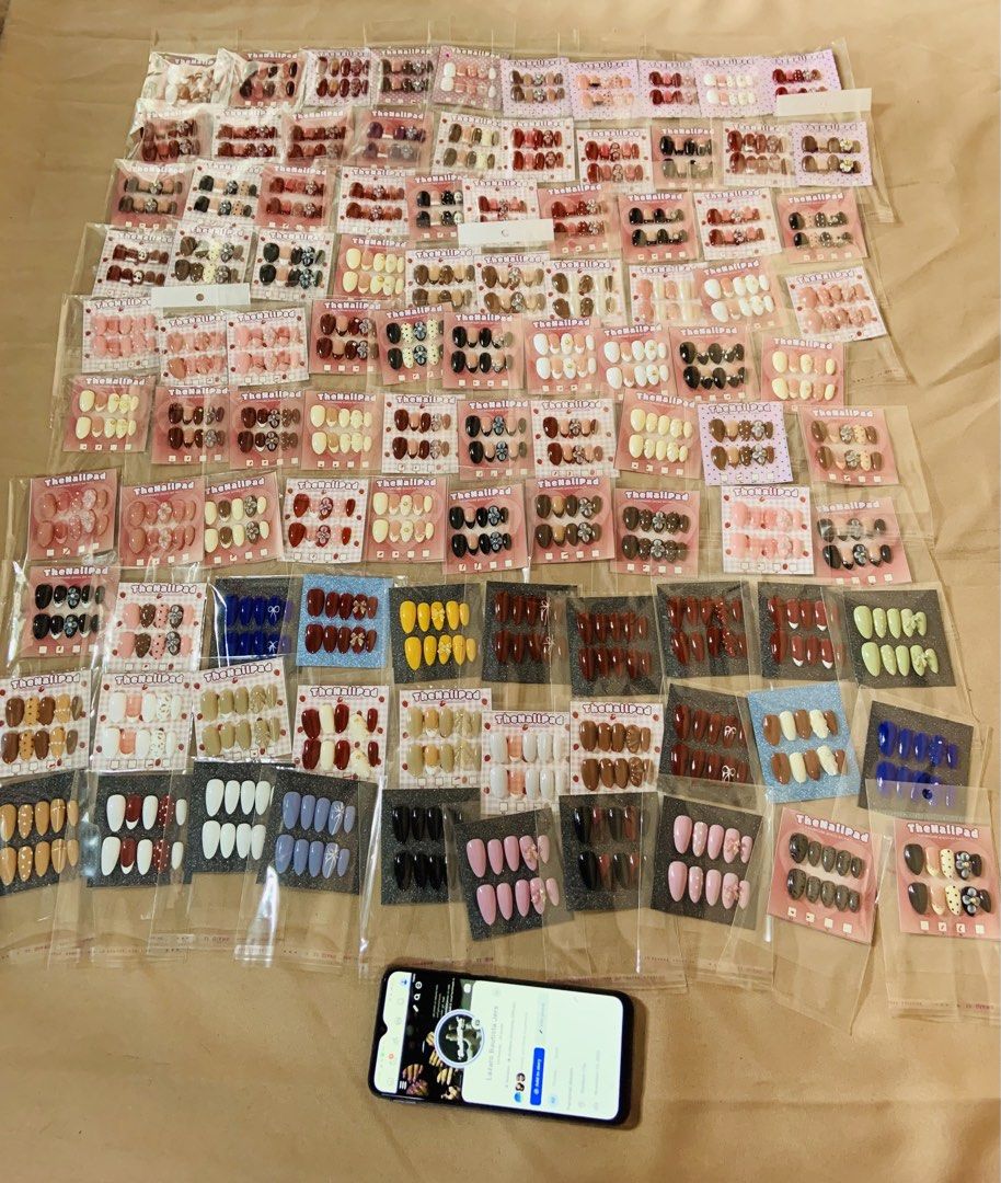 Assorted Press-On Nails - Various Designs and Colors (Category: Hands & Nails) located in Manila. Submitted by thenailpadbyjers (Listing ID 1464628096, Image 2). Description: - Huge selection of press-on nails available! - Many styles and colors: solid, patterned, glitter, and more. - Each set is individually packaged. - Perfect for a fast, salon-quality manicure. - Great for trying out different nail trends. - Can be purchased individually or as