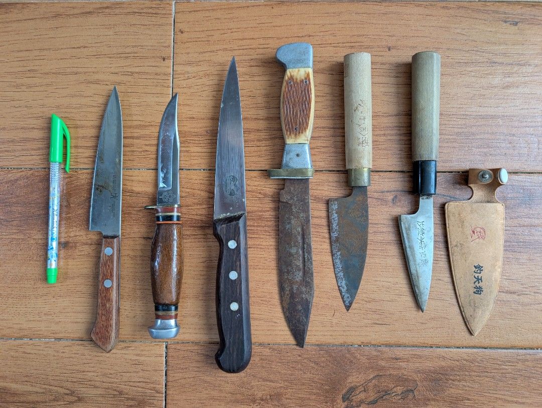 Assorted Vintage Kitchen and Utility Knives Collection (Category: Knives & Chopping Boards) located in Naga. Submitted by kenshin78 (Listing ID 1464734214, Image 1). Description: - Bundle of 6 various knives + 1 leather sheath - Includes trusted brands: J.A. Henckels International and Victorinox - Features several Japanese traditional woodworking and fishing knives with wooden handles - Blade material: Mix of stainless steel and carbon steel - Co