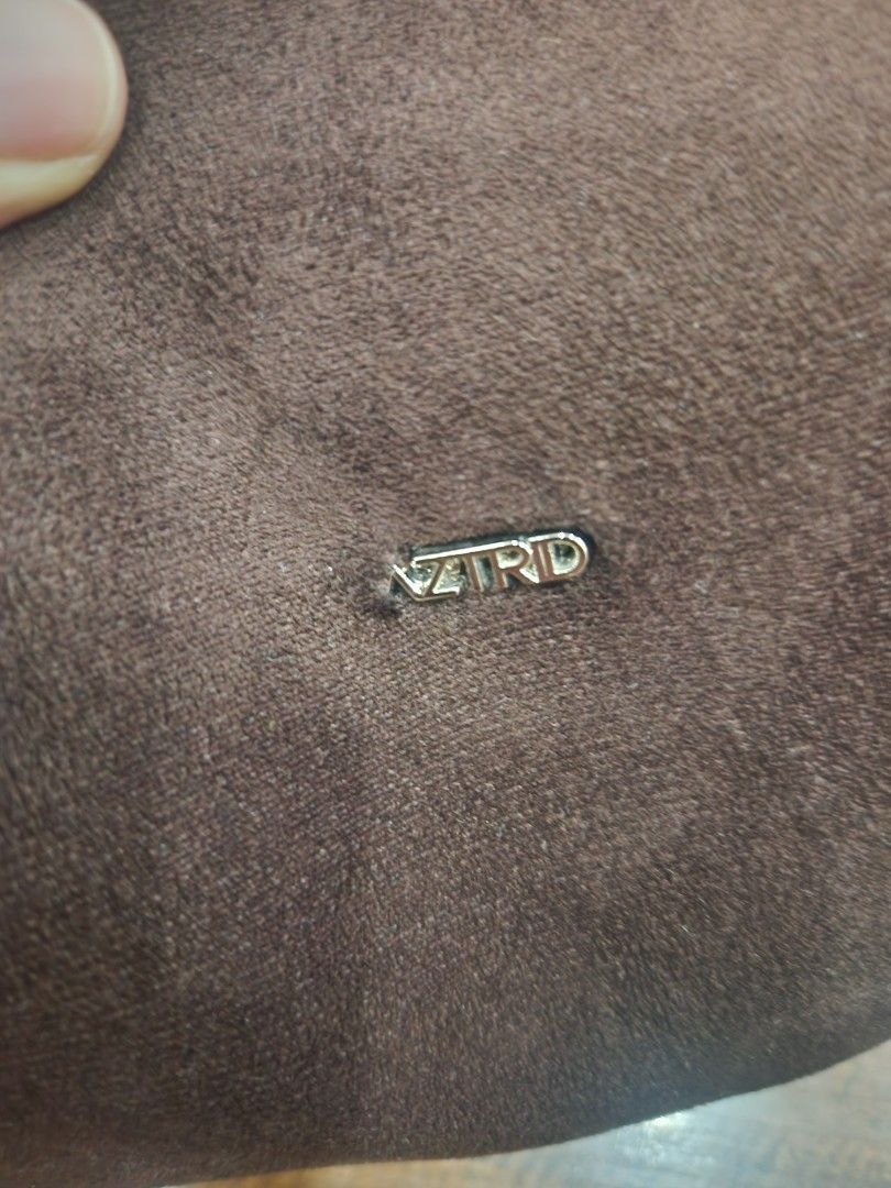 Astrid Brown Suede Shoulder Bag (Category: Shoulder Bags) located in Makati City. Submitted by bargain_hunt (Listing ID 1464645091, Image 3). Description: - Dark brown suede shoulder bag - Zipper closure - Internal pocket - Simple and chic design - Ideal for everyday use - Fits your essentials minimal flaw on the logo .