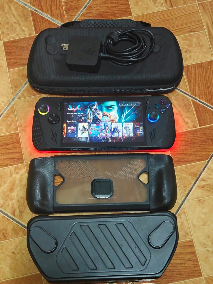 ASUS ROG ALLY X CONSOLE (Category: Others) located in Valenzuela. Submitted by amdps (Listing ID 1464623613, Image 1). Description: ASUS ROG Ally X w/ 1TB NVMe M.2 SSD 24GB LDDR5X Ram AMD Ryzen Z1 Extreme Windows 11 Home NO ISSUES. excellent condition With Games installed! Replace with Hall effect Joystick Replace Backplate with RGB Light Inclusion: Asus 65w Charger Carrying Bag JSUAX Case and Shell Cover Tempered Glass installed.