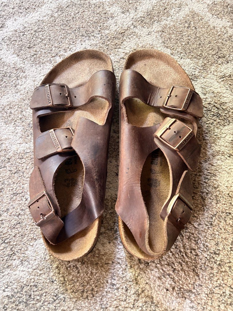 Auth Preloved Birkenstock Milano (Category: Shoe inserts & accessories) located in Paranaque City. Submitted by silentstone.dolphin (Listing ID 1464664214, Image 2). Description: Oiled Leather Material.. Brass Buckle.. Visible Print.. Size 43-44eur.. Clean&Ready to Wear✅ Super Gwapo in Actual😍.