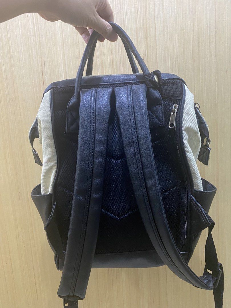 Authentic Anello Backpack (Category: Backpacks) located in Muntinlupa City. Submitted by pinknpeach (Listing ID 1464614362, Image 3). Description: Condition: 8/10 No structural flaws, only aesthetic (small pen mark on the cream part). Otherwise, clean and no smell. This was washed/cleaned prior to storage. .