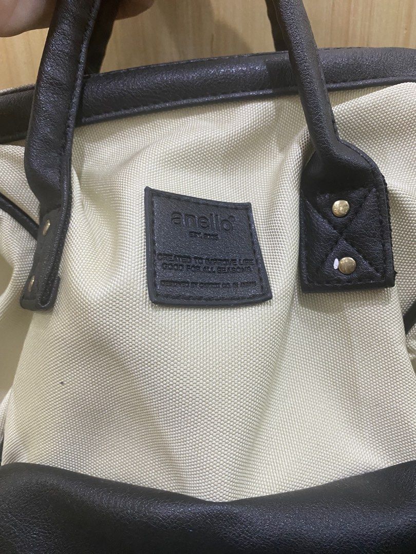 Authentic Anello Backpack (Category: Backpacks) located in Muntinlupa City. Submitted by pinknpeach (Listing ID 1464614362, Image 2). Description: Condition: 8/10 No structural flaws, only aesthetic (small pen mark on the cream part). Otherwise, clean and no smell. This was washed/cleaned prior to storage. .