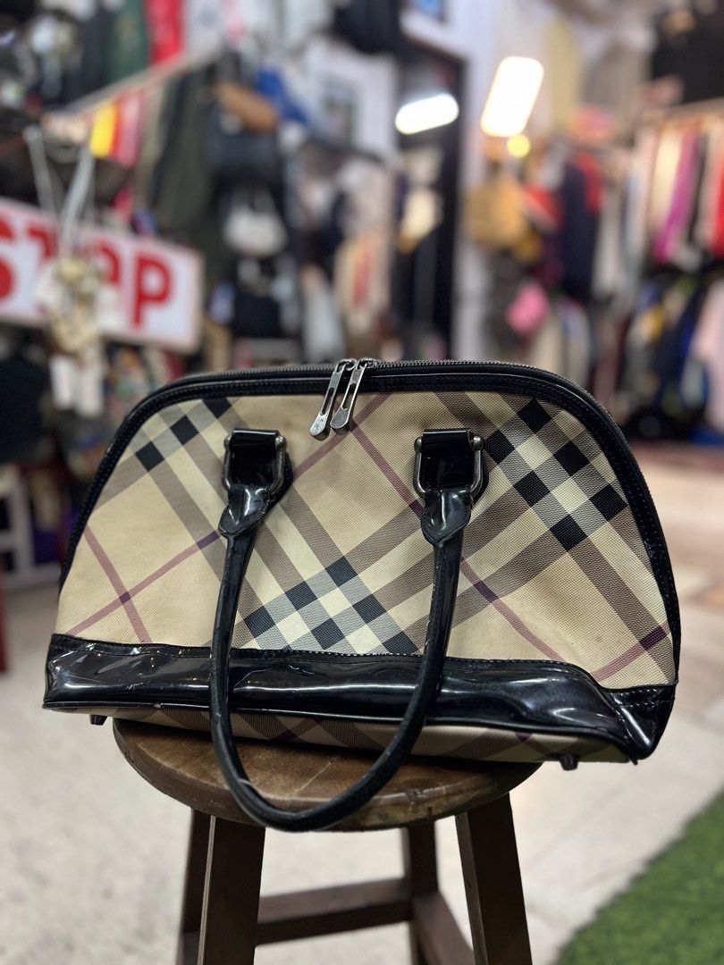 Authentic Burberry Nova Satchell Bag (Category: Luxury Bags & Wallets) located in Alcala. Submitted by capnbagseller (Listing ID 1464749779, Image 1). Description: Authentic and Nego Few stains exterior Stains interior Missing one metal stand below Baguio Loc.