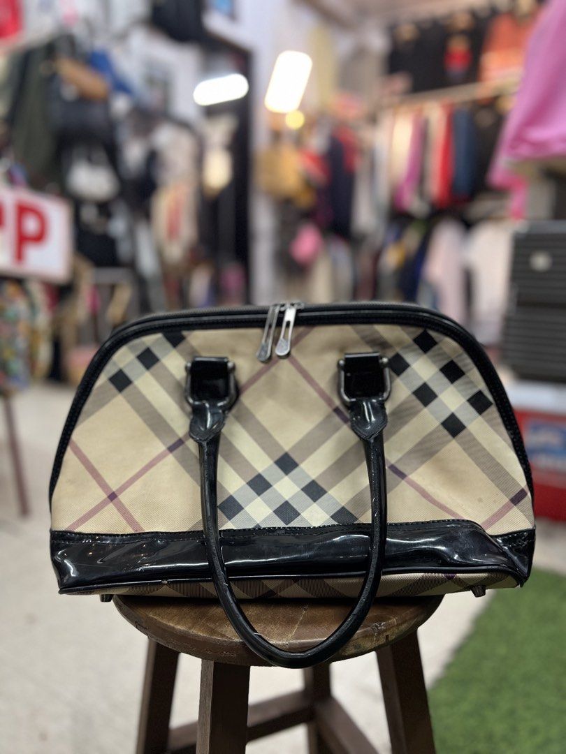 Authentic Burberry Nova Satchell Bag (Category: Luxury Bags & Wallets) located in Alcala. Submitted by capnbagseller (Listing ID 1464749779, Image 2). Description: Authentic and Nego Few stains exterior Stains interior Missing one metal stand below Baguio Loc.