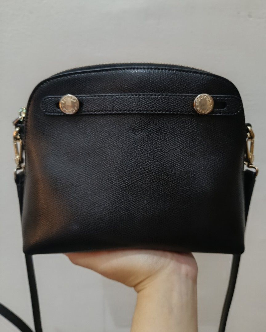 Authentic Furla Mini Piper crossbody bag (Category: Cross-body Bags) located in General Mariano Alvarez. Submitted by plsjewelryemporium (Listing ID 1464697933, Image 1). Description: Authentic Furla Mini Piper Sling bag Genuine leather Pwede po sa maselan Intact rubber lining No major issues ( minimal signs of usage only) • Width: 7.68 inches (19.5 cm) • Height: 6.1 inches (15.5 cm) • Depth: 2.36 inches (6 cm) PHP 2,300 + SF MOP: Gcash MOD: J&t 