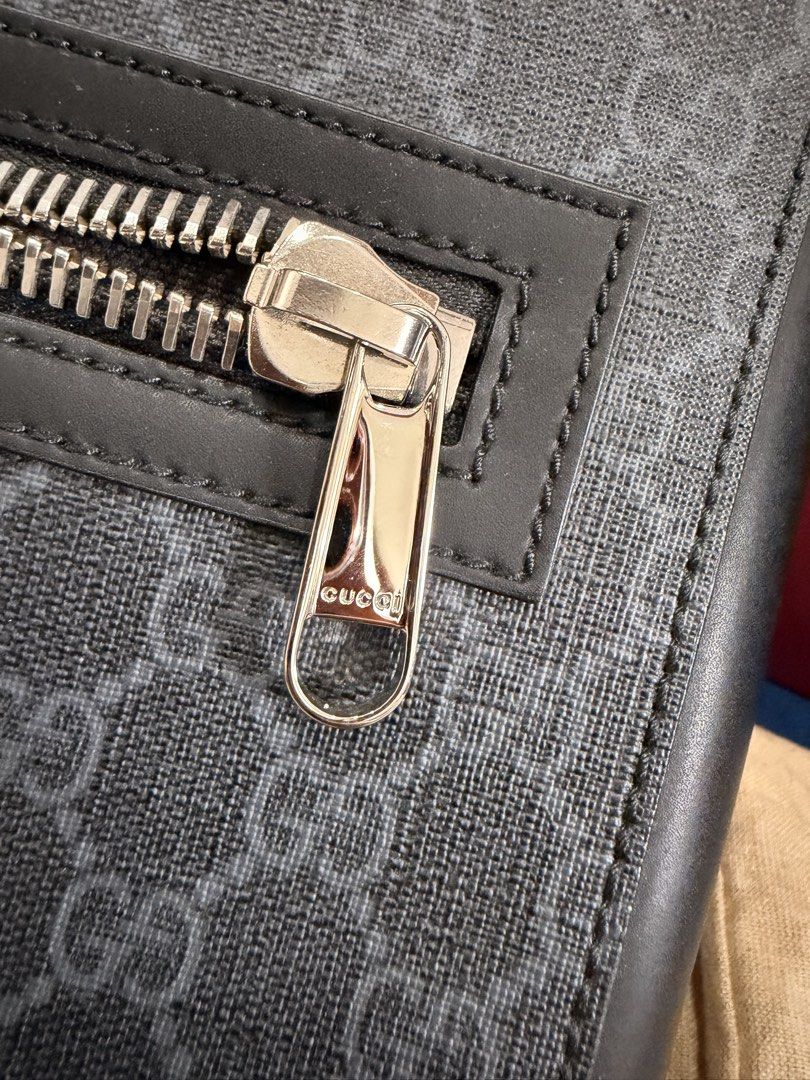 Authentic GUCCI messenger bag (Category: Luxury Bags & Wallets) located in Antipolo. Submitted by guchilove (Listing ID 1464623558, Image 3). Description: Selling an authentic Gucci Messenger cross body Bag in classic monogram canvas with genuine leather trim. 100% Authentic — Serial number photo included in listing photos. Comes with original Gucci dust bag and box cards and paper bag. Pre-loved in great condition (clean canvas, smooth hardware,