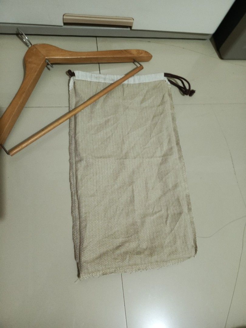 Authentic HERMES Dust Bag with Wooden Hanger (Category: Tote Bags) located in Irosin. Submitted by whanchore55263 (Listing ID 1464572769, Image 3). Description: - Authentic Hermes dust bag with iconic embroidered logo. - Sturdy wooden hanger with metal hook. - Ideal for protecting and organizing luxury bags and accessories. 16x9 inch .