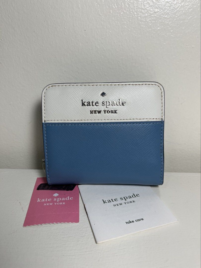 Authentic Kate Spade Staci Colorblock Small Bifold Wallet (Category: Wallets & Card holders) located in Baguio. Submitted by nailongdeclutters (Listing ID 1464620300, Image 1). Description: ⭐️Authentic Kate Spade from Canada (as seen in the tag) ⭐️Color: Blue and white ⭐ Bi-fold wallet with ID slot, card slots, and coin compartment ⭐️With tag and care booklet ⭐️Brand new condition .