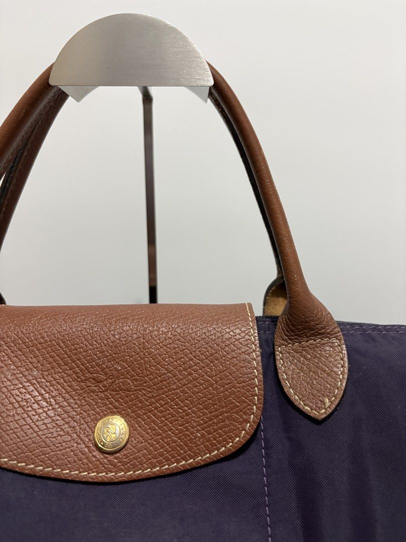 Authentic Longchamp Le Pliage Large Short Handle (Category: Shoulder Bags) located in Subic. Submitted by dear.jeveaph (Listing ID 1464606059, Image 3). Description: Authentic Longchamp Le Pliage Large Short Handle - Minimal signs of use - Needs wash - Still in great condition Friendly reminder: This is a preloved bag. Please manage your expectations. If you want a flawless bag, buy one in the store. 😊.