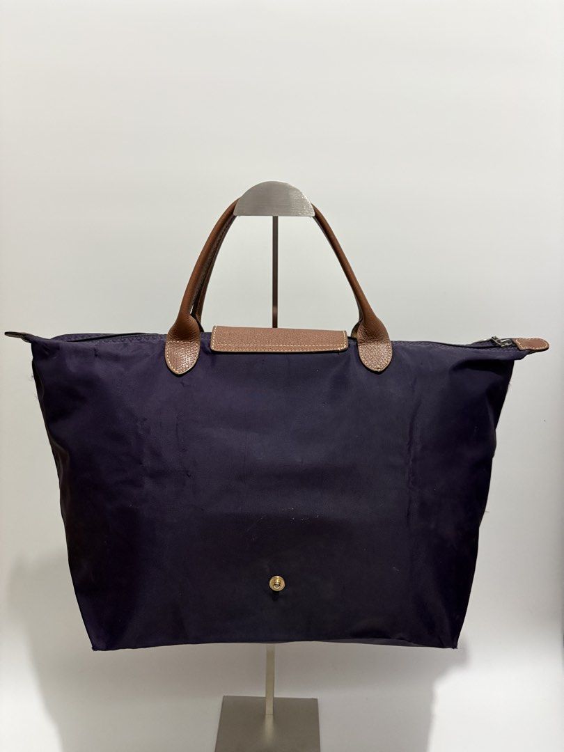 Authentic Longchamp Le Pliage Large Short Handle (Category: Shoulder Bags) located in Subic. Submitted by dear.jeveaph (Listing ID 1464606059, Image 2). Description: Authentic Longchamp Le Pliage Large Short Handle - Minimal signs of use - Needs wash - Still in great condition Friendly reminder: This is a preloved bag. Please manage your expectations. If you want a flawless bag, buy one in the store. 😊.