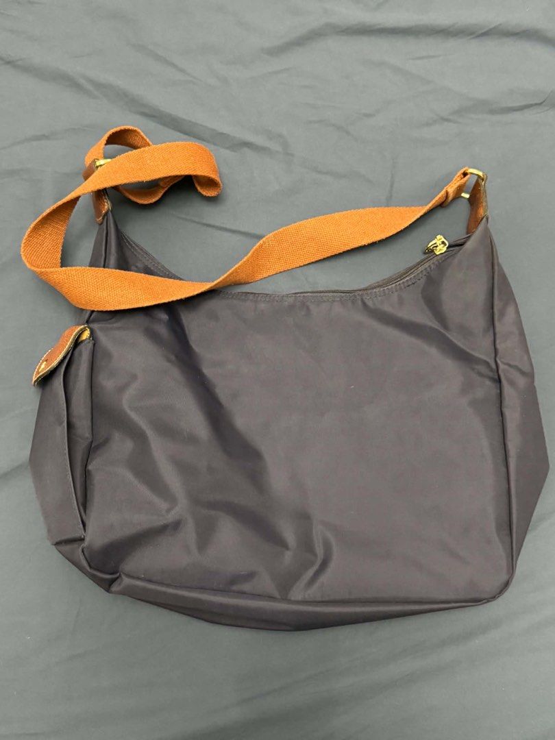 Authentic vintage 1990s Longchamp Nylon Hobo Bag (Category: Luxury Bags & Wallets) located in San Fernando. Submitted by ahjiminssi (Listing ID 1464769104, Image 3). Description: - authentic, hard to let this one go - decluttering kaya selling it low - manage your expectations.