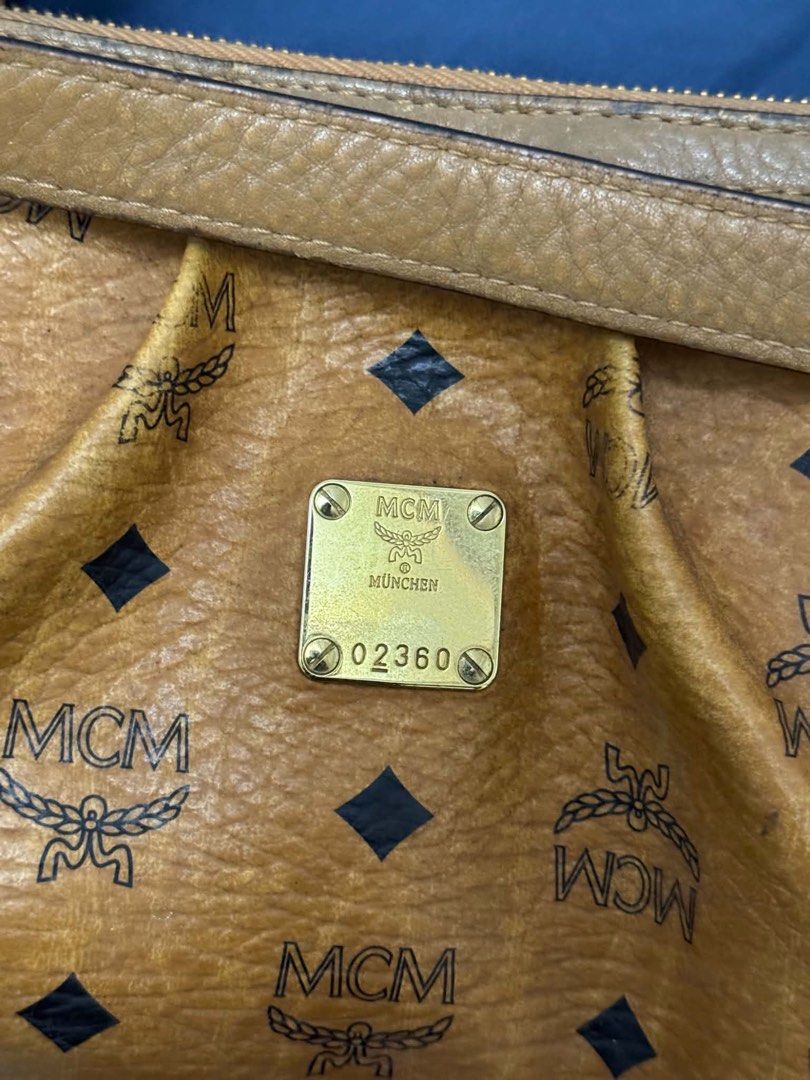 Authentic MCM Pleated Visetos 2-Way Bag (Category: Luxury Bags & Wallets) located in San Fernando. Submitted by ahjiminssi (Listing ID 1464768235, Image 2). Description: - authentic, decluttering kaya selling it low - marumi lang konti sa loob, tinamad na ako linisin - manage your expectations - preloved, still in good condition.