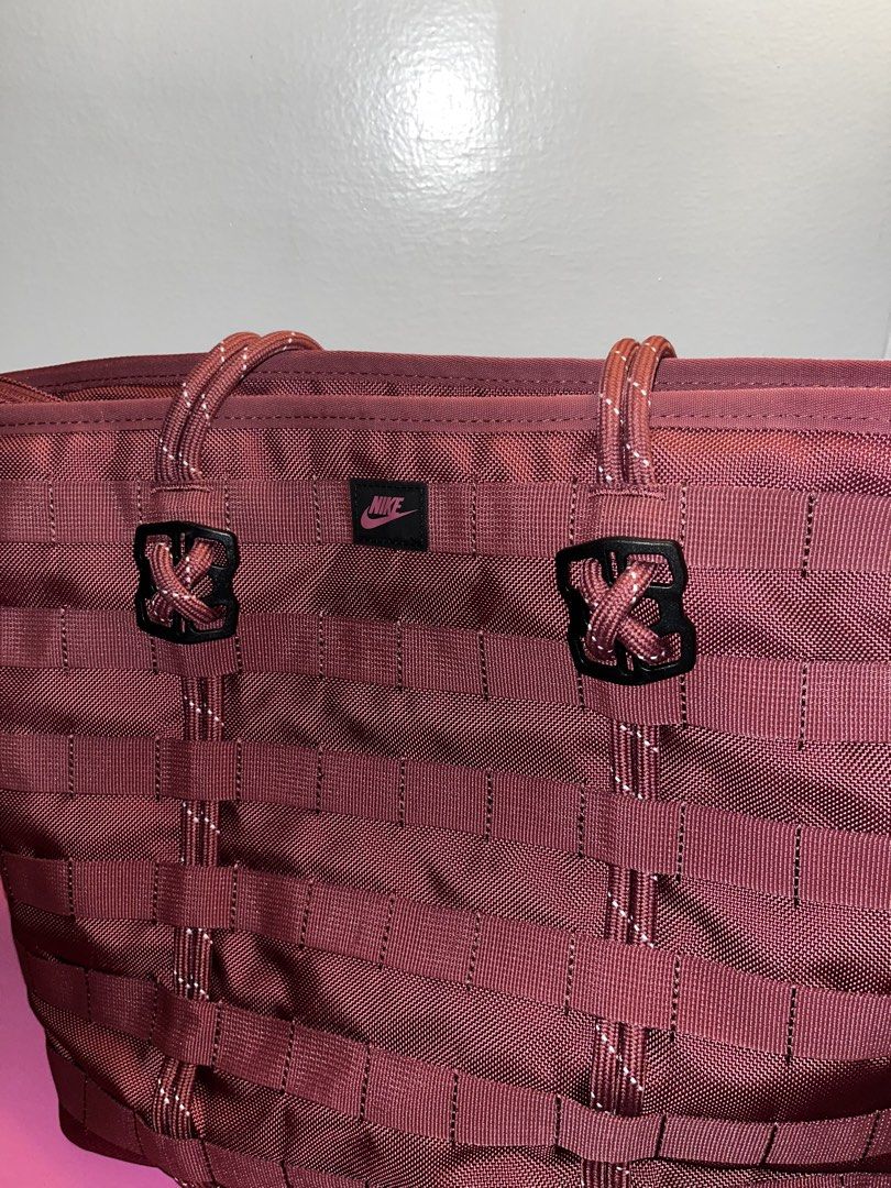 Authentic Nike Tote in Pink Smoke (Category: Tote Bags) located in Marikina City. Submitted by beautygirlph (Listing ID 1464692723, Image 1). Description: - Brand: Nike - Color: Maroon - Material: Durable polyester.