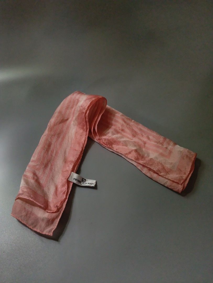 AUTHENTIC PIERRE BALMAIN PARIS Silk Scarf (Category: Activewear) located in Cagayan de Oro. Submitted by warmbird-f84aab (Listing ID 1464646769, Image 1). Description: 💯 100% Pure Silk | Soft Peach / Blush Pink Striped - Brand: Pierre Balmain Paris - Material: 100% Silk (SILK) — soft, lightweight, smooth texture - Color: Peach / Blush pink gradient stripes - Condition: Pre-loved, gently used | No major damage, clean, vibrant color - Tags intact: