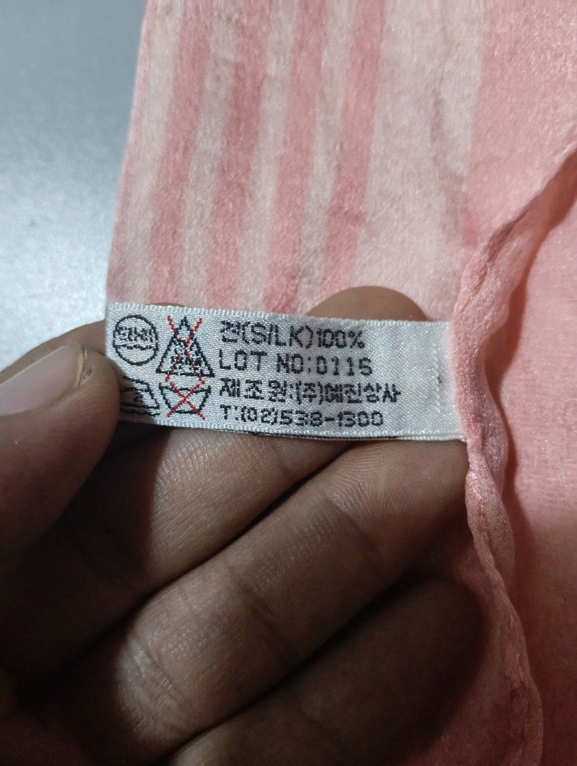 AUTHENTIC PIERRE BALMAIN PARIS Silk Scarf (Category: Activewear) located in Cagayan de Oro. Submitted by warmbird-f84aab (Listing ID 1464646769, Image 3). Description: 💯 100% Pure Silk | Soft Peach / Blush Pink Striped - Brand: Pierre Balmain Paris - Material: 100% Silk (SILK) — soft, lightweight, smooth texture - Color: Peach / Blush pink gradient stripes - Condition: Pre-loved, gently used | No major damage, clean, vibrant color - Tags intact: