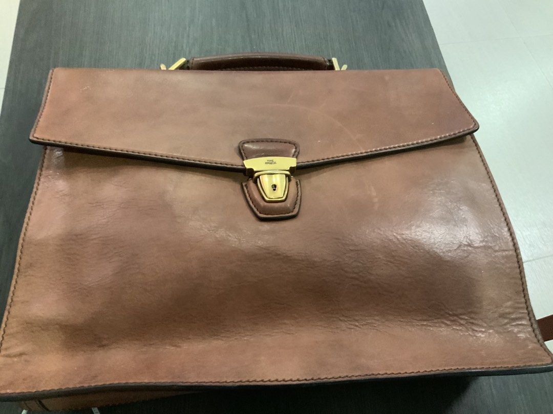 Authentic Vintage The Bridge Brown Leather Briefcase (Category: Briefcases) located in San Fernando. Submitted by destinydeals04 (Listing ID 1464572255, Image 2). Description: - Original Classic brown leather briefcase from The Bridge - Secure clasp closure with keyhole - Beautiful patina from use - Spacious interior for documents and laptop - Ideal for work or travel Xcellent condition .