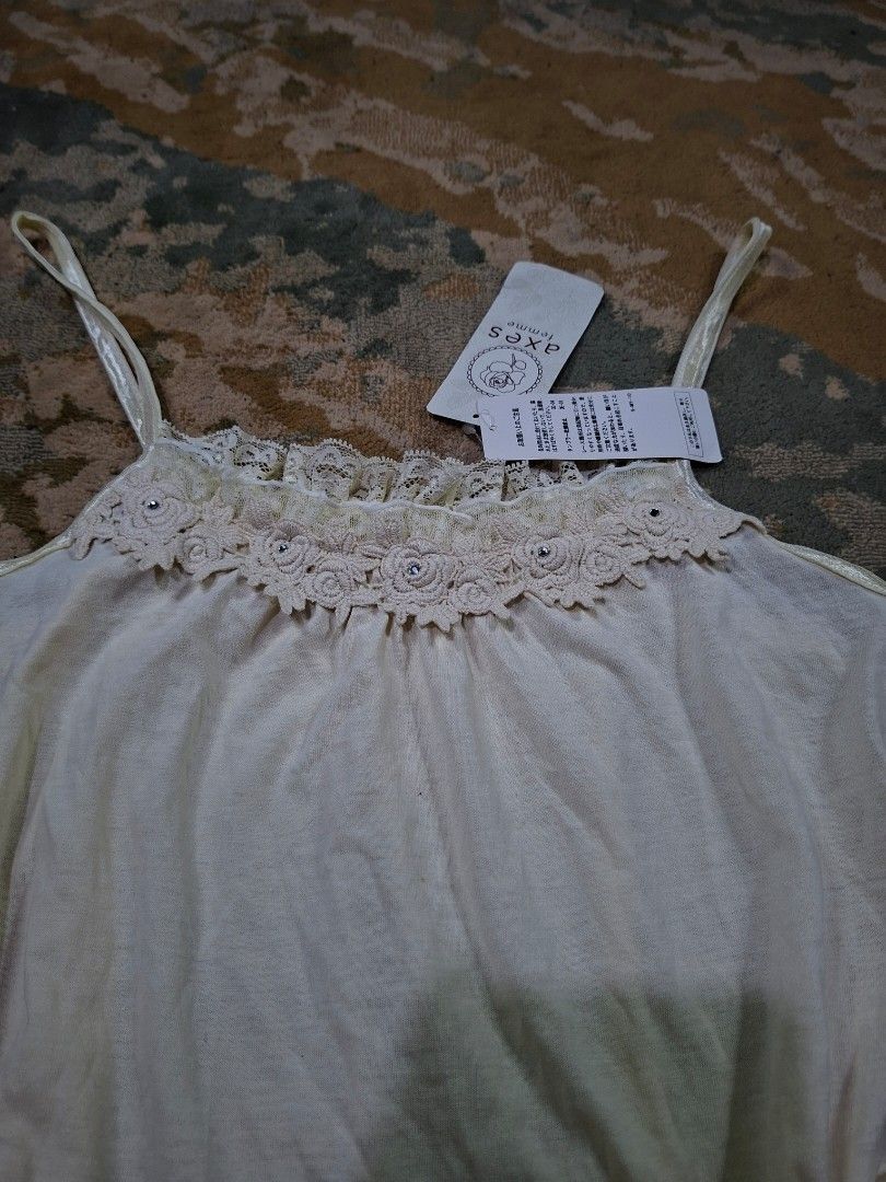 Axes femme patterned sheer long camisole (Category: Sleeveless) located in Tagaytay City. Submitted by joselito_acosta (Listing ID 1464580255, Image 3). Description: Axes femme patterned sheer long camisole Brand new with hang tag No issues Medium on tag Mine: 250+shipping fee only Location: tagaytay Dm to purchase 📩 📩 📩.