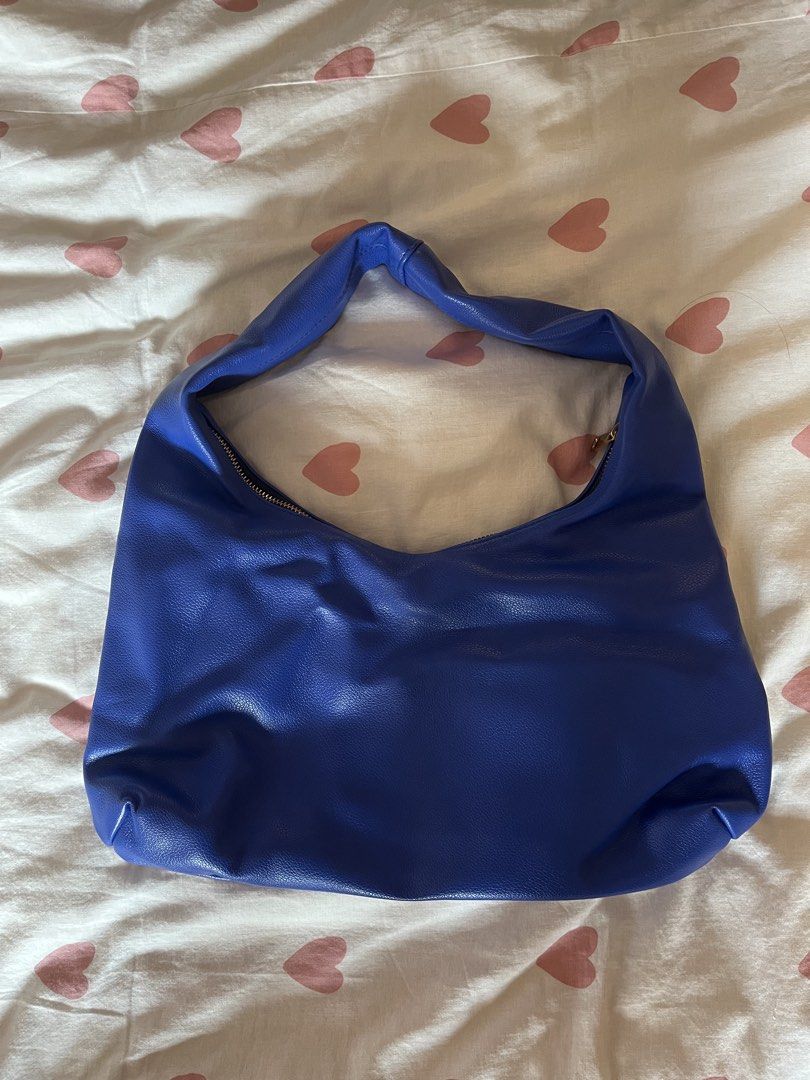 AZTRID Royal Blue Medium Hobo Bag (Category: Shoulder Bags) located in Manila. Submitted by peanutbuttercupp (Listing ID 1464620423, Image 2). Description: - Aztrid Medium Hobo Bag in Royal Blue - Minor flaw in the front but barely noticeable - Price Negotiable - PM for more details - MOP: gcash/maya/maribank.