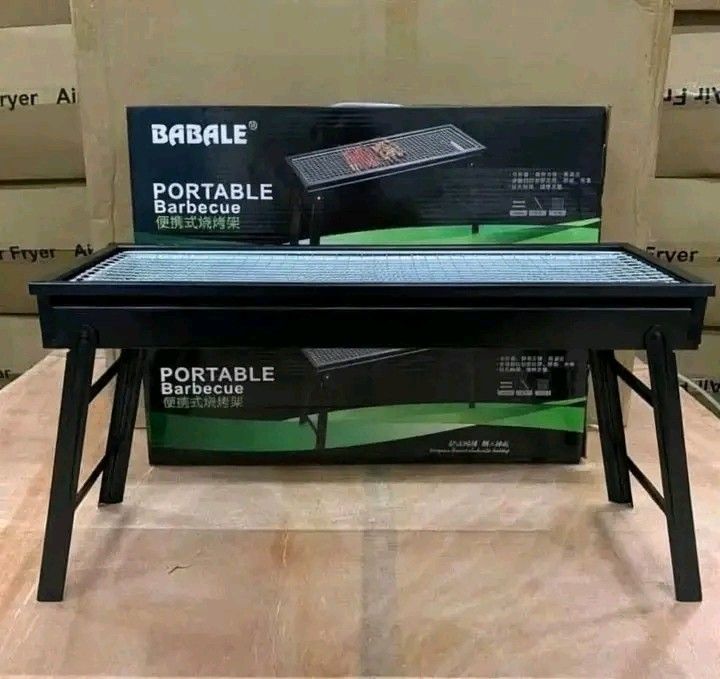 BABALE Portable Barbecue Grill Black (Category: BBQ, Grills & Hotpots) located in Manila. Submitted by berdenmarl01688 (Listing ID 1464748158, Image 1). Description: - Brand: BABALE Portable Barbecue Grill (Black) - Dimensions: 60cm (L) x 22cm (W) x 31.5cm (H) - Features folding legs for hassle-free storage and transport - Durable metal construction with a wire grill grate - Ideal for camping, balcony grilling, and outdoor hangouts - Condition: B