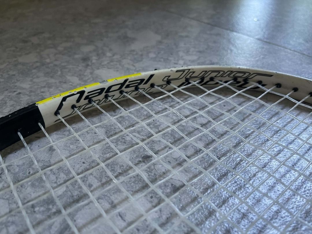 Babolat Nadal Junior Tennis Racket (Category: Racket and Ball Sports) located in Caloocan City. Submitted by oliveestr95391 (Listing ID 1464576358, Image 3). Description: Head Size: 680 sq cm / 105 sq in Length: 25 inches Weight: 240g unstrung Target age: 9-10 years old, 130-140cm height Color: Yellow-Black Nadal design Material: Aluminum frame This is the bigger junior size before moving to adult 27" rackets. The 680sq cm head makes it more forg