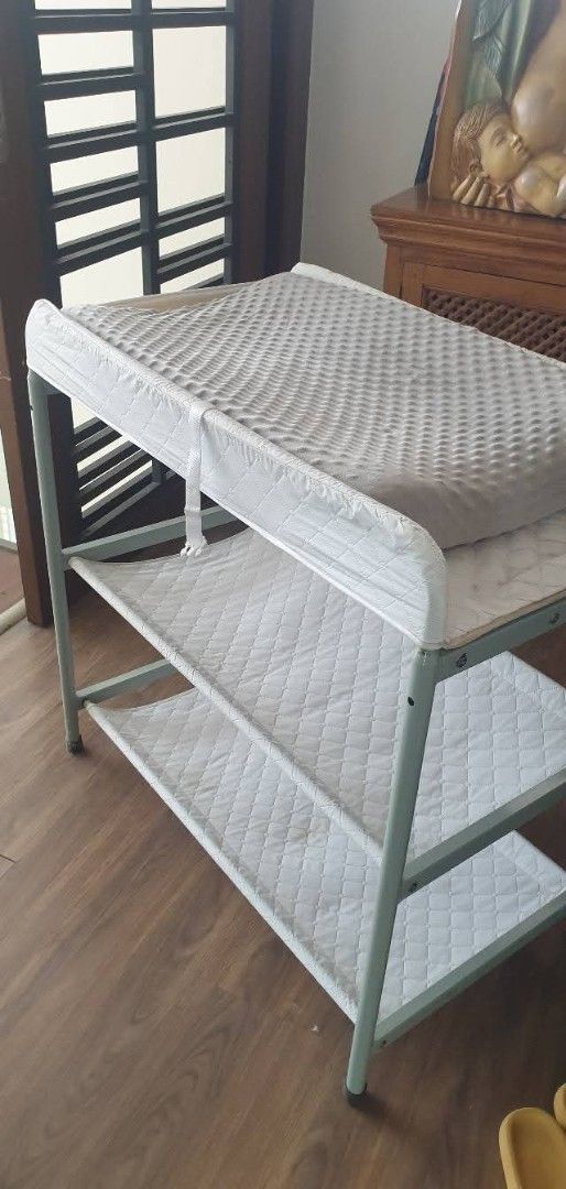 Baby Changing Table with Shelves (Category: Shelves, Cabinets & Racks) located in Manila. Submitted by jamillejco91 (Listing ID 1464634110, Image 3). Description: - Sturdy baby changing table - Two shelves for ample storage - Padded changing surface with raised sides for safety - Easy to assemble and move around - Perfect for any nursery delivery from Sta.Ana, Manila.