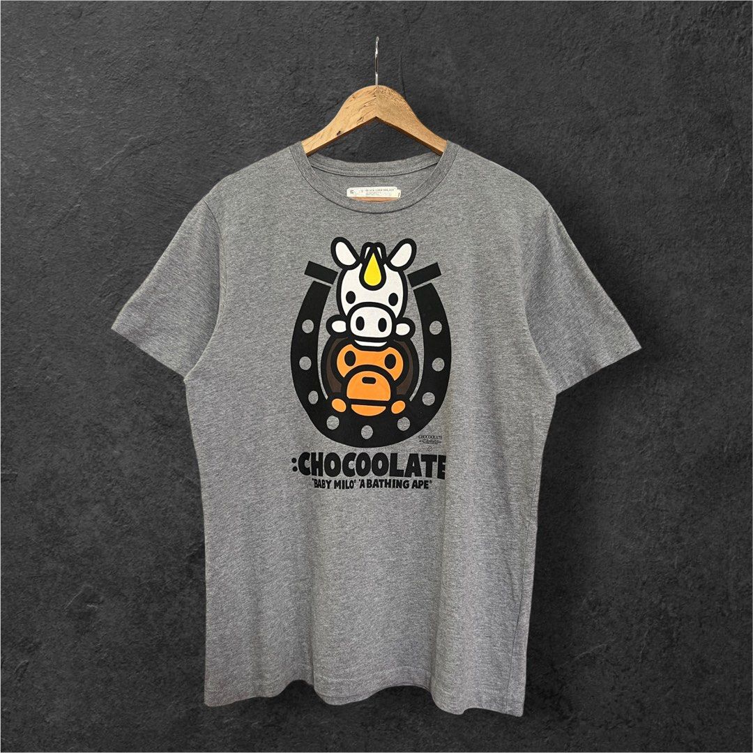 BAPE BABY MILO X CHOCOOLATE (Category: Tshirts & Polo Shirts ) located in Solano. Submitted by brokeboyzsupply (Listing ID 1464727197, Image 1). Description: SiZe: M Width: 20.5 Length: 27.5 Color rate: 9.5/10 Condition: 9.5/10 Issue/s: Minimal signs of usage “Color may vary due to lighting”.