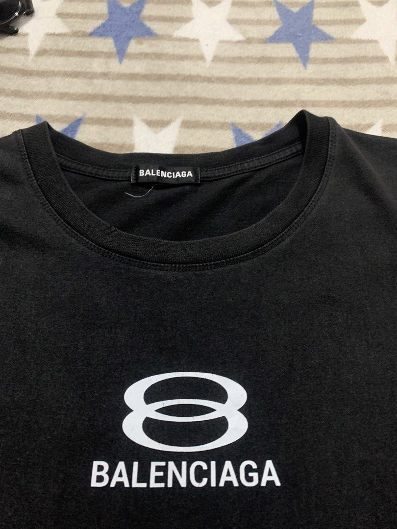 Balenciaga BB Interlock / Mode Logo T-Shirt (Category: Tshirts & Polo Shirts ) located in Calumpit. Submitted by sidethrift25 (Listing ID 1464753026, Image 3). Description: Width - 22.5 / Length - 27 Large dimes Good condition , Missing Wash Tag Flaws Good Fade Minimal Hairline At Back Print, Colorate 8.9/10.