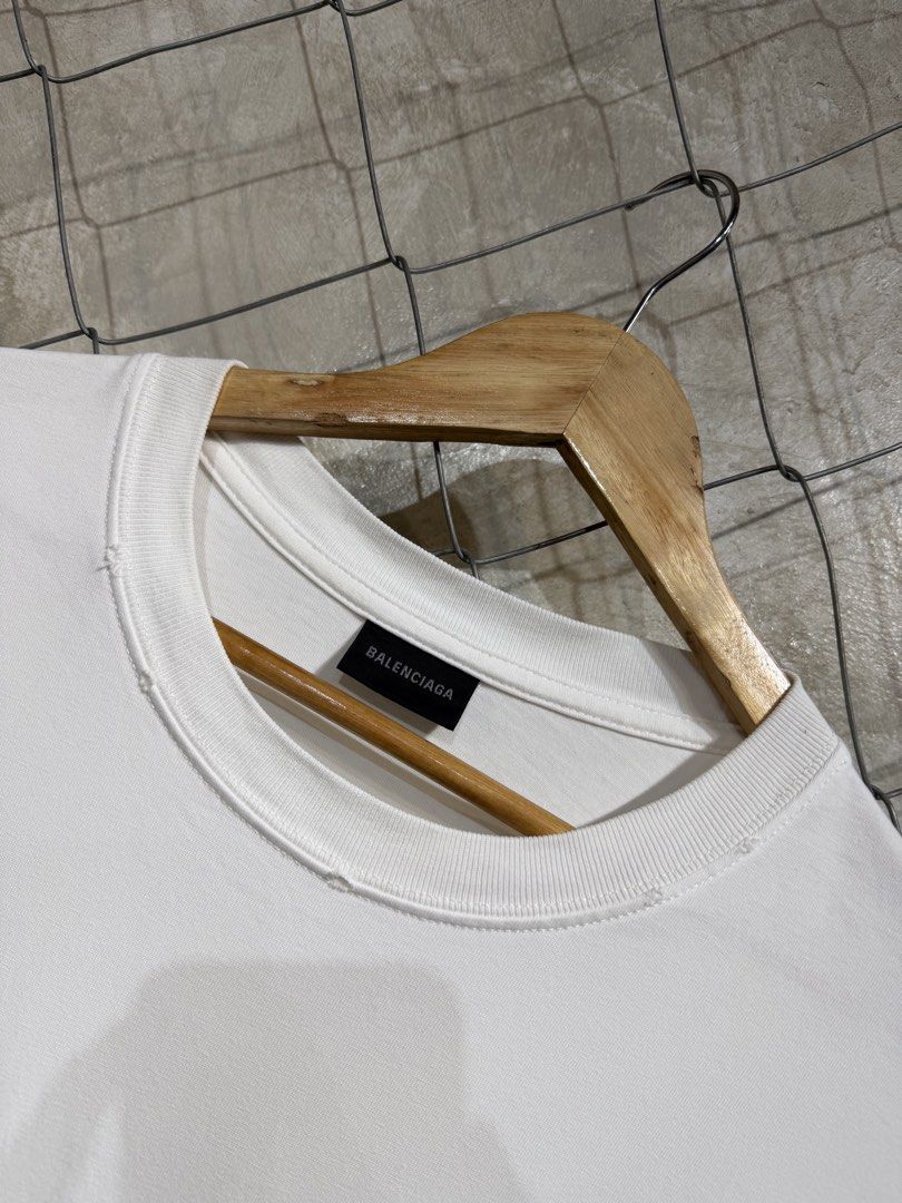 Balenciaga Campaign Logo Distressed Tee. (Category: Tshirts & Polo Shirts ) located in Manila. Submitted by ardobe.mnl (Listing ID 1464747072, Image 3). Description: Balenciaga Campaign Logo White Tee. Size: Large Dimes: 22x29 Condition: Excellent Flaw: None! Dm for inquiries!.