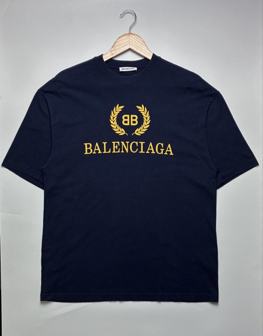 Balenciaga Laurel BB Logo (Category: Tshirts & Polo Shirts ) located in Palayan City. Submitted by room_of_thrift (Listing ID 1464691931, Image 1). Description: Want To Sell 🏷️ Balenciaga Laurel BB Logo ( Navy Blue ) Size (W) 21 / (L) 29 Color Rate - 9.5/10 or Better Color May Vary Due To Light DM 📩.