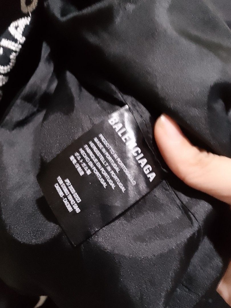 Balenciaga Paris All Over Logo Bomber Jacket (Category: Luxury Apparel) located in Manila. Submitted by bengluxury (Listing ID 1464579353, Image 3). Description: - Authentic Balenciaga jacket - All-over 'Balenciaga Paris' logo print - Made in Portugal - Features a drawstring waist - Long sleeves - Perfect for fashion enthusiasts.
