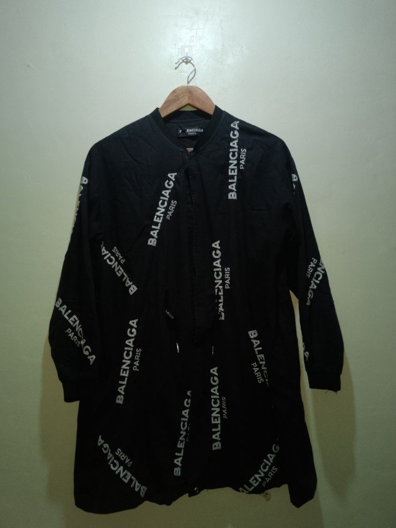 Balenciaga Paris All Over Logo Bomber Jacket (Category: Luxury Apparel) located in Manila. Submitted by bengluxury (Listing ID 1464579353, Image 1). Description: - Authentic Balenciaga jacket - All-over 'Balenciaga Paris' logo print - Made in Portugal - Features a drawstring waist - Long sleeves - Perfect for fashion enthusiasts.