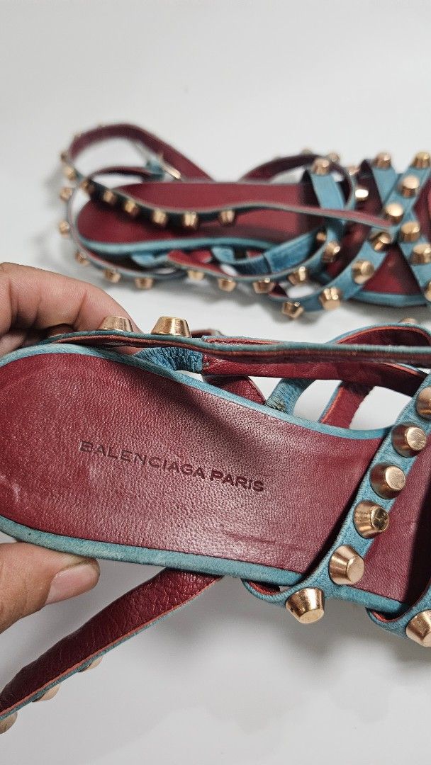 Balenciaga Paris Studded Gladiator Sandals (Category: Sandals) located in Alfonso. Submitted by jbcamet (Listing ID 1464604498, Image 2). Description: - Balenciaga Paris gladiator sandals - Teal blue suede with burgundy leather lining - Gold tone studs all over straps - Straps wrap around the ankle - Statement piece for any outfit - Signs of wear on soles and straps.