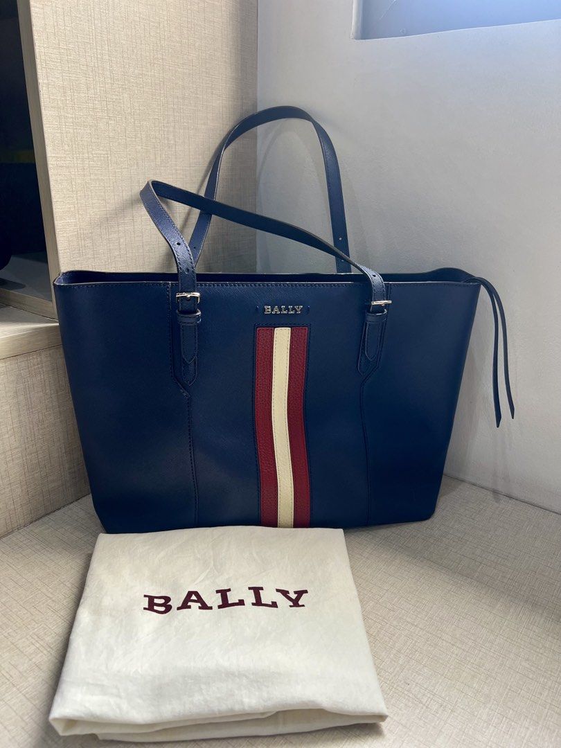 BALLY SUPRA CENTRAL STRIPE TOTE BAG (Category: Tote Bags) located in Quezon City. Submitted by fromkimwithless (Listing ID 1464736487, Image 1). Description: - Color: Navy Blue with Signature Red & White Bally Stripe - Size: Large (can fit 14inch laptop) - Includes: dustbag - Purchased: CN/2016.